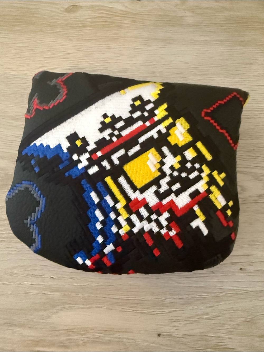 Men's Patterned Black Knit Accessory with Red, Yellow & Blue Accents